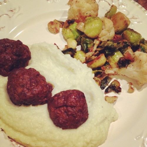 mashed cauli with chorizo meatballs from Practical Paleo and roasted brussels with more cauli!